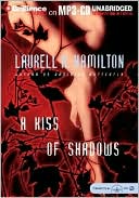 A Kiss of Shadows (Meredith Gentry Series #1) written by Laurell K. Hamilton