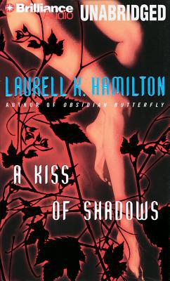 A Kiss of Shadows written by Laurell K. Hamilton