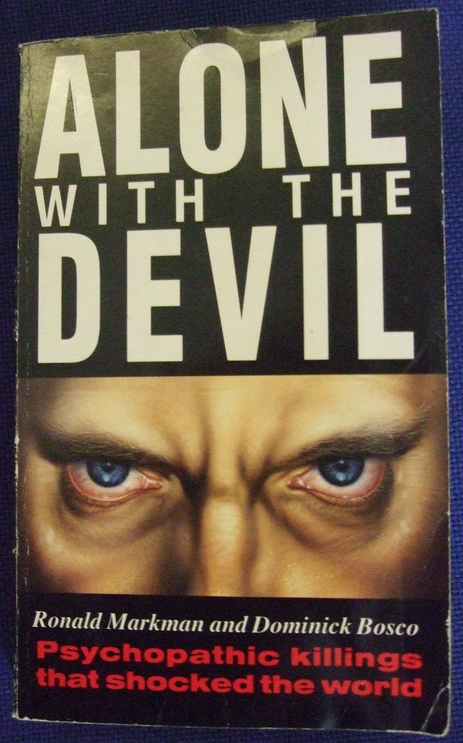 Alone with the devil magazine reviews